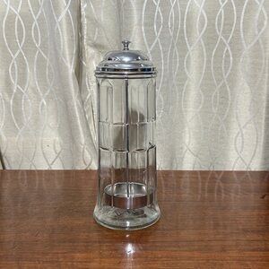 Clear Glass Container with metal lifter inside
Straw holder Barber Accessory